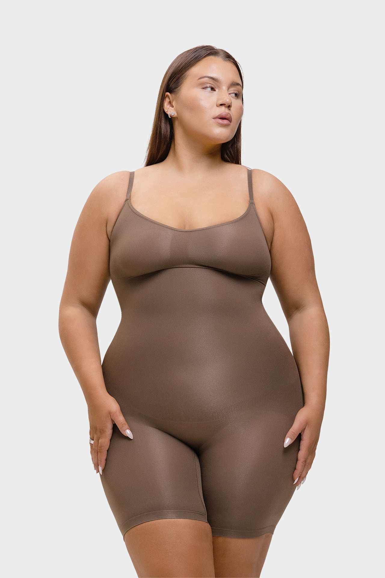 Model wearing a mocha full-body shaping bodysuit